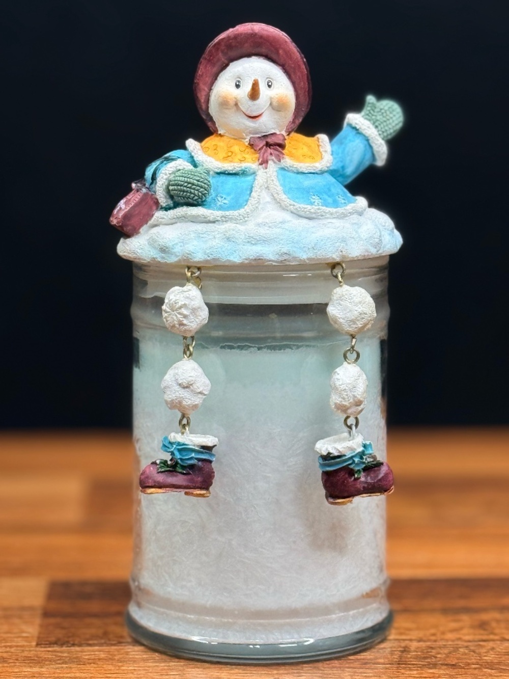 CANDLE-LITE “Holiday Snow” Candle with Dangling Leg Snowman Lid